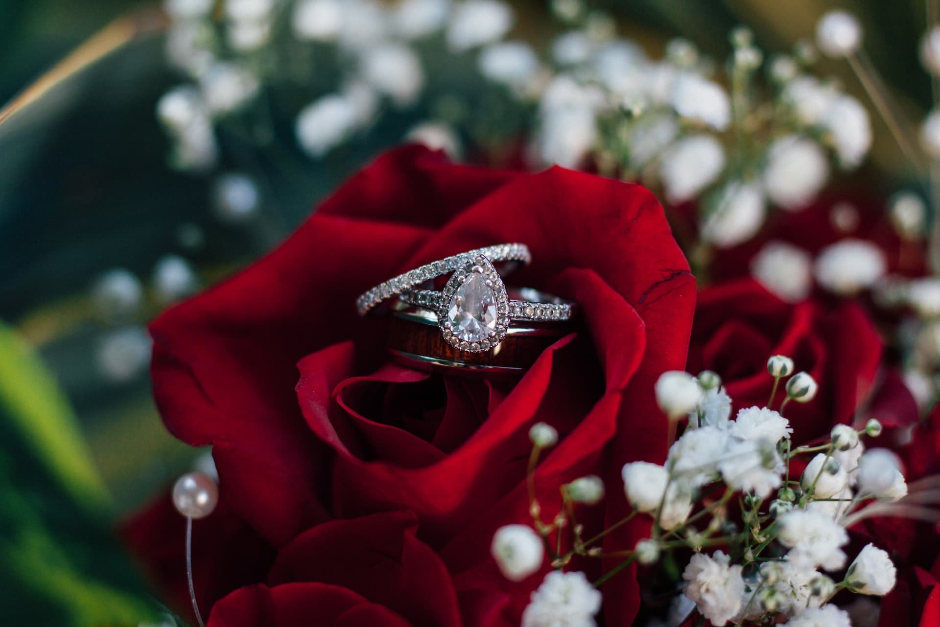 pear cut diamond engagement ring on rose
