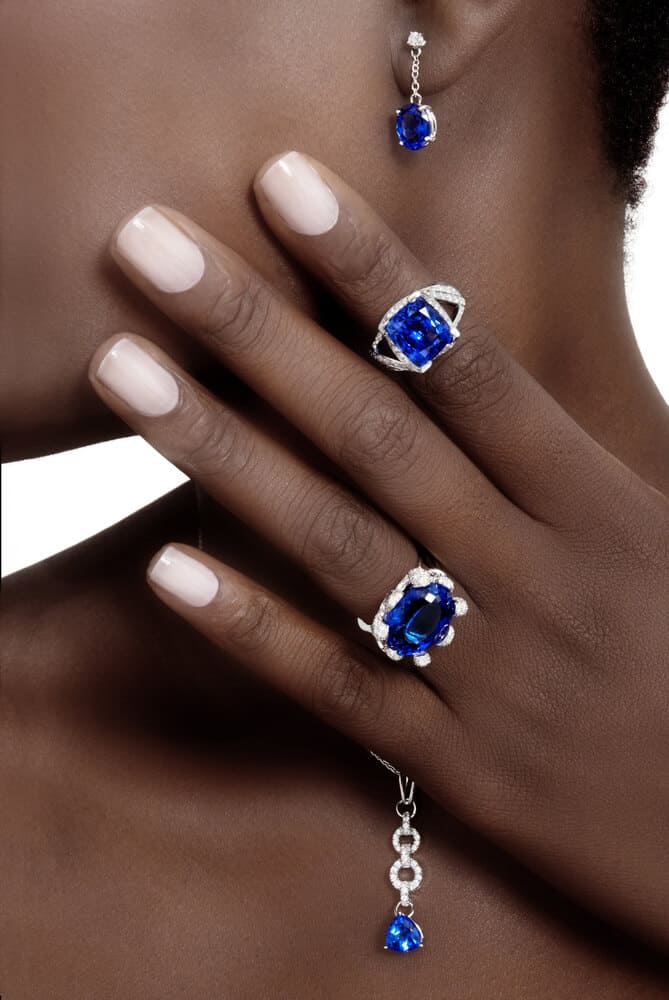 Tanzanite ring and erarrings jewelry on a black woman