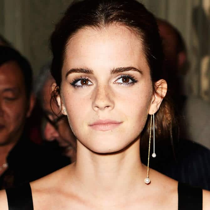 Emma Watson rocking the asymmetrical earring look on the red carpet.