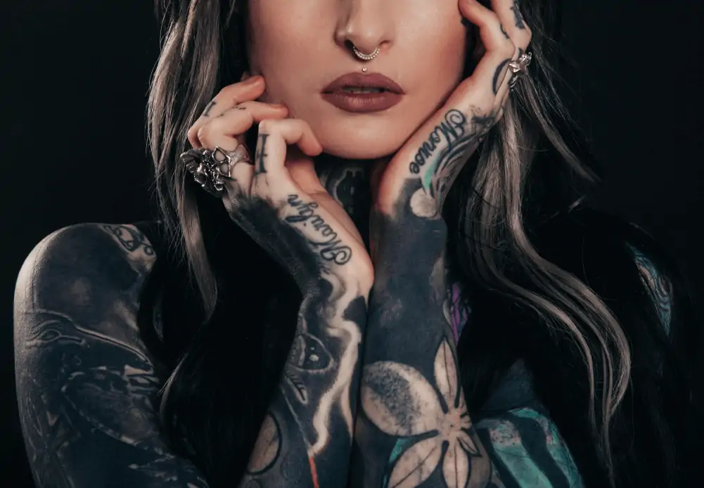 Girl with nose ring and tattoo