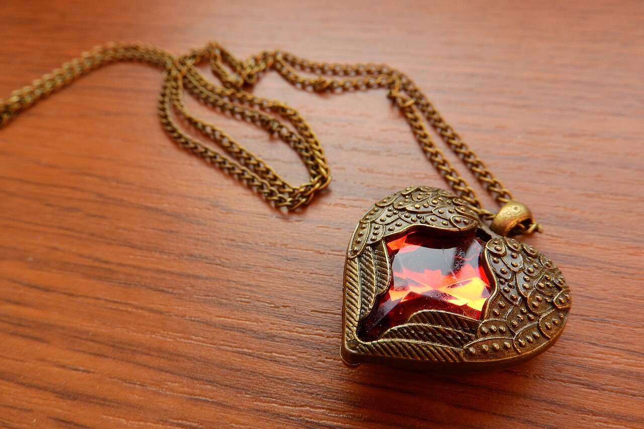 brass pendant with gemstone