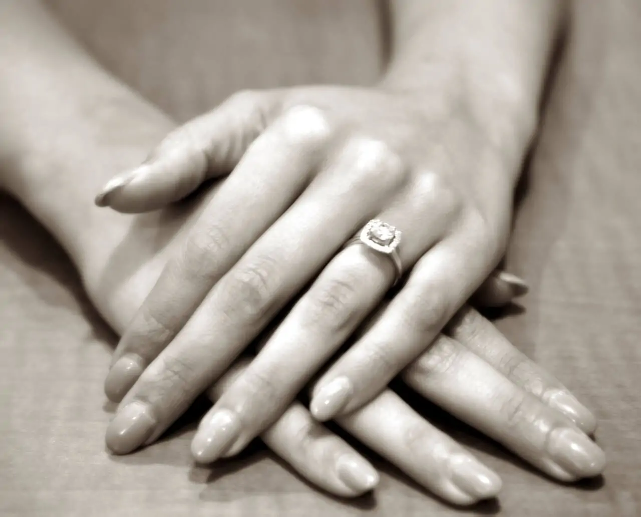 Woman and Man Holding Hands with Engagement Rings · Free Stock Photo