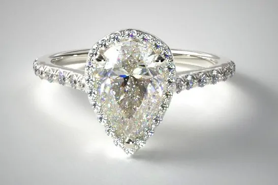 halo setting for pear shape diamond engagement ring