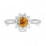 orange diamond engagement ring in halo setting