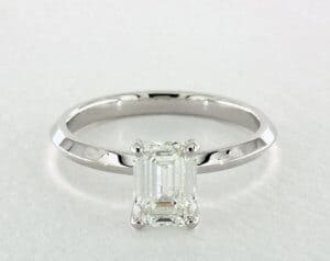 emerald prong setting engagement ring
