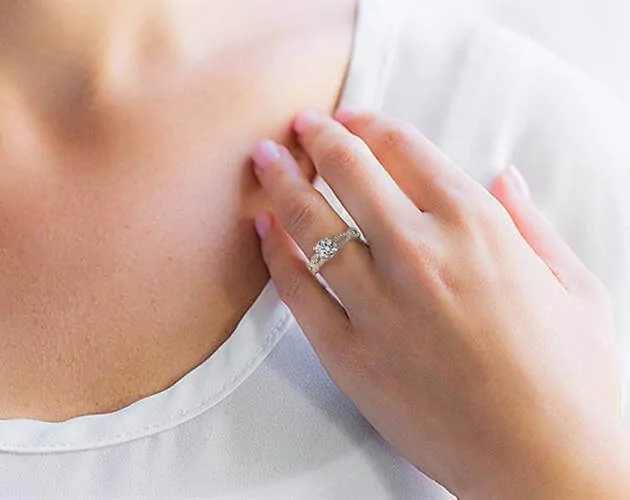 Engagement ring on girls finger