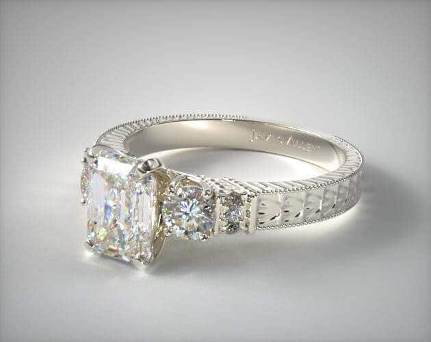 Emerald shape diamond in vintage setting engagement ring