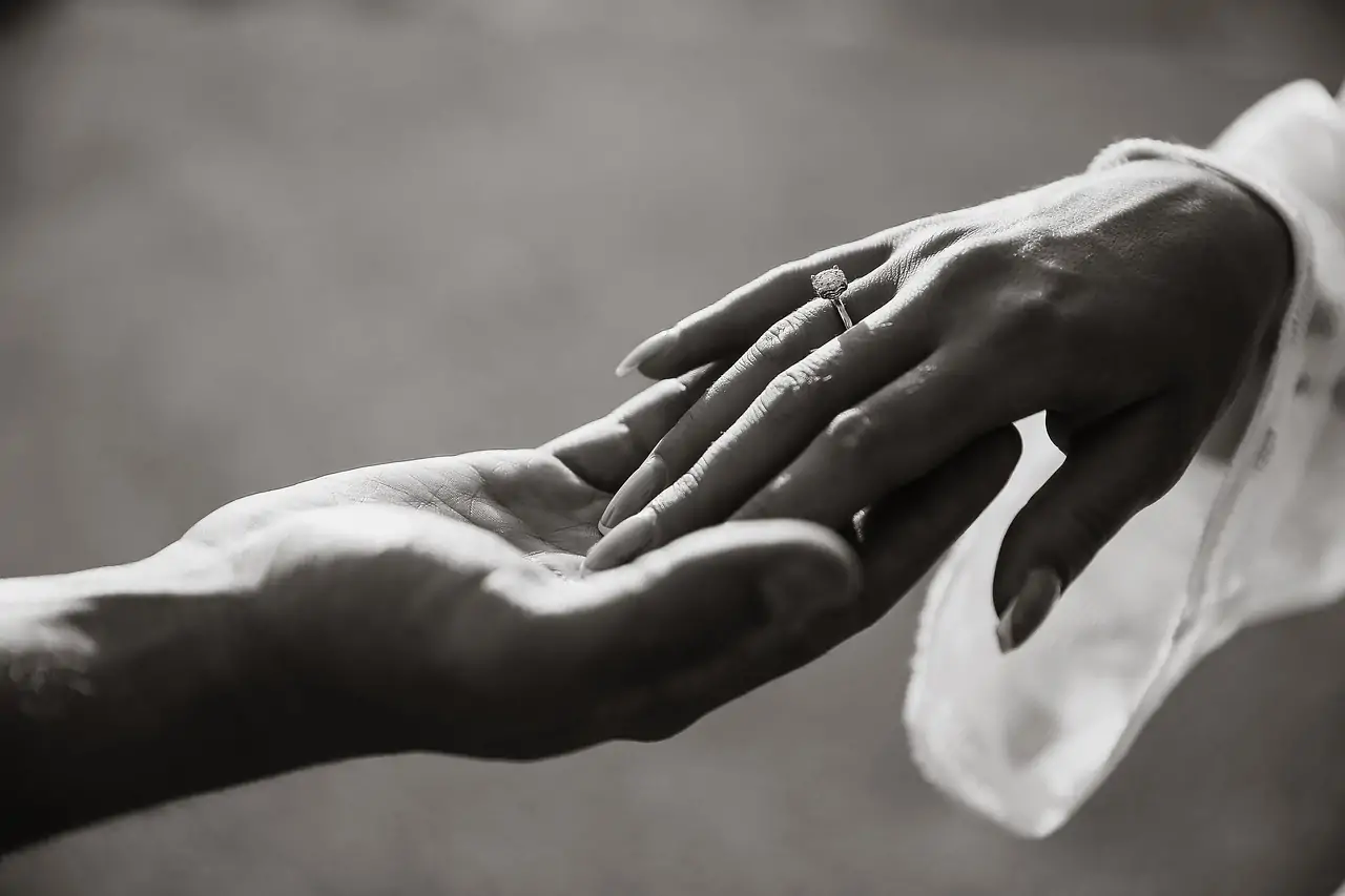 Hands and engagement ring