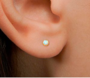 Opal stud on ear