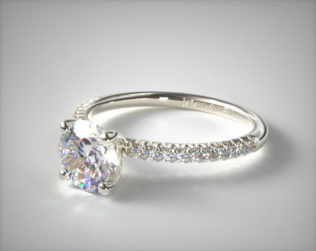 Engagement ring pave setting with melee diamonds