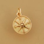 Golden compass charm as graduation gift