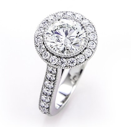 Halo diamond engagement ring with fire