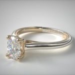 oval cut diamond in solitaire engagement ring