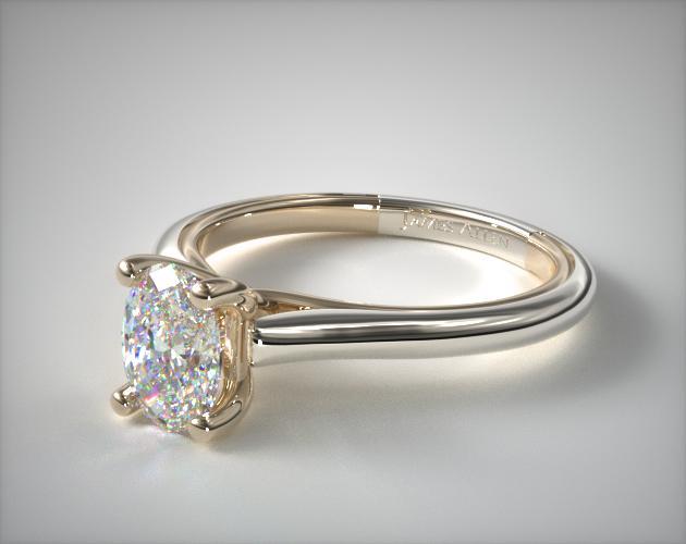 oval cut diamond in solitaire engagement ring