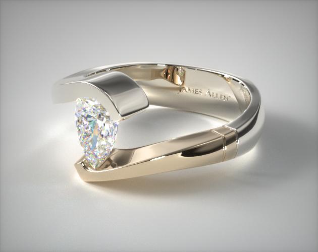 Pear shaped tension setting engagement ring