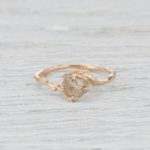 Raw diamond bezel setting engagement ring