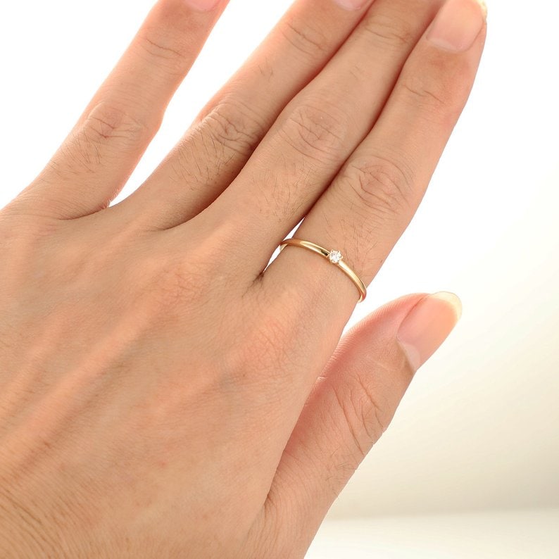 small solitaire minimalist engagement ring