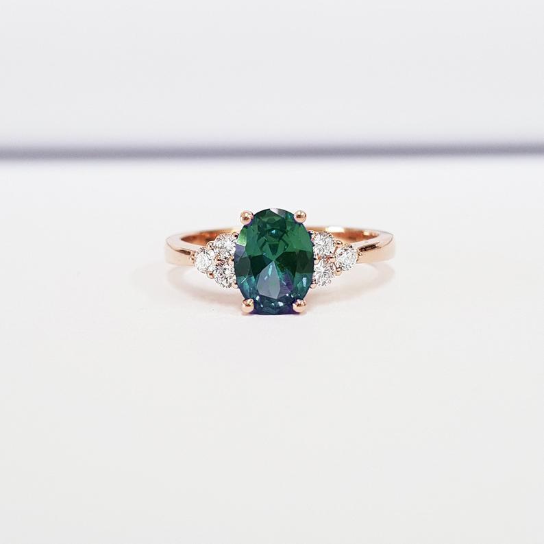 synthetic alexandrite and diamond ring in rose gold