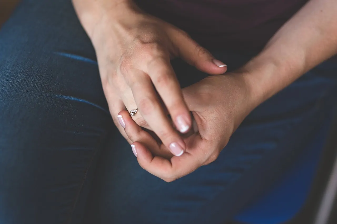 ring on womans hand