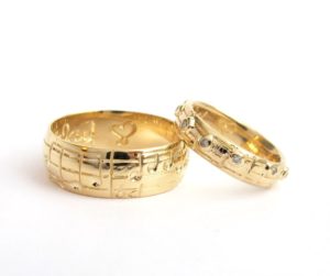 engraved song notes golden ring