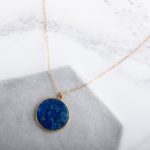 Blue lapis lazuli pendant in gold setting