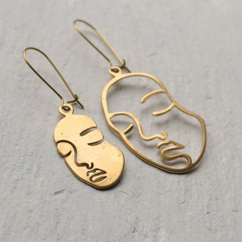 mismatched face earrings