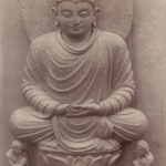Buddha sitting on lotus