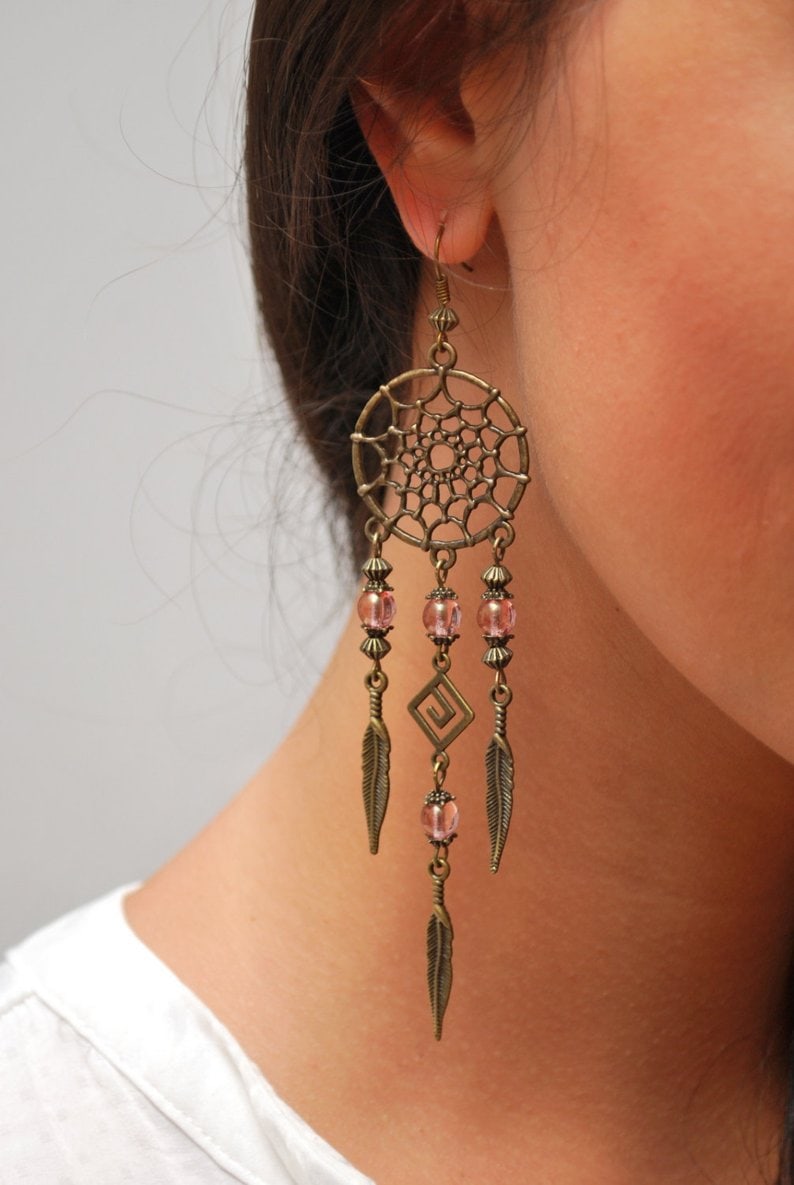 Girl wearing dreamcatcher earrings