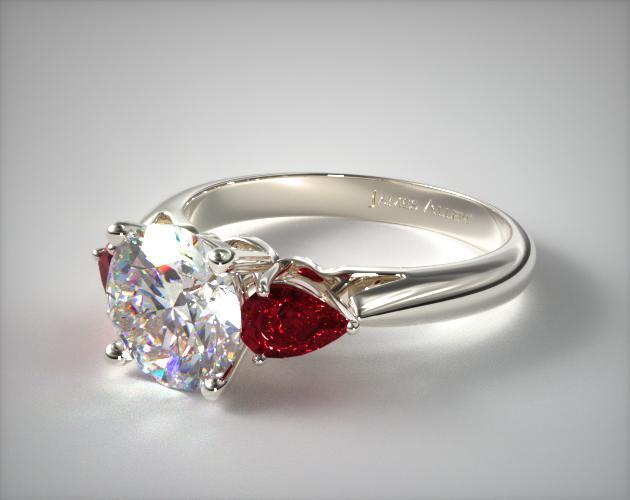 Three stone gemstone engagement ring with ruby