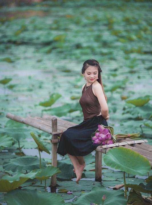 Girl with lotus flower