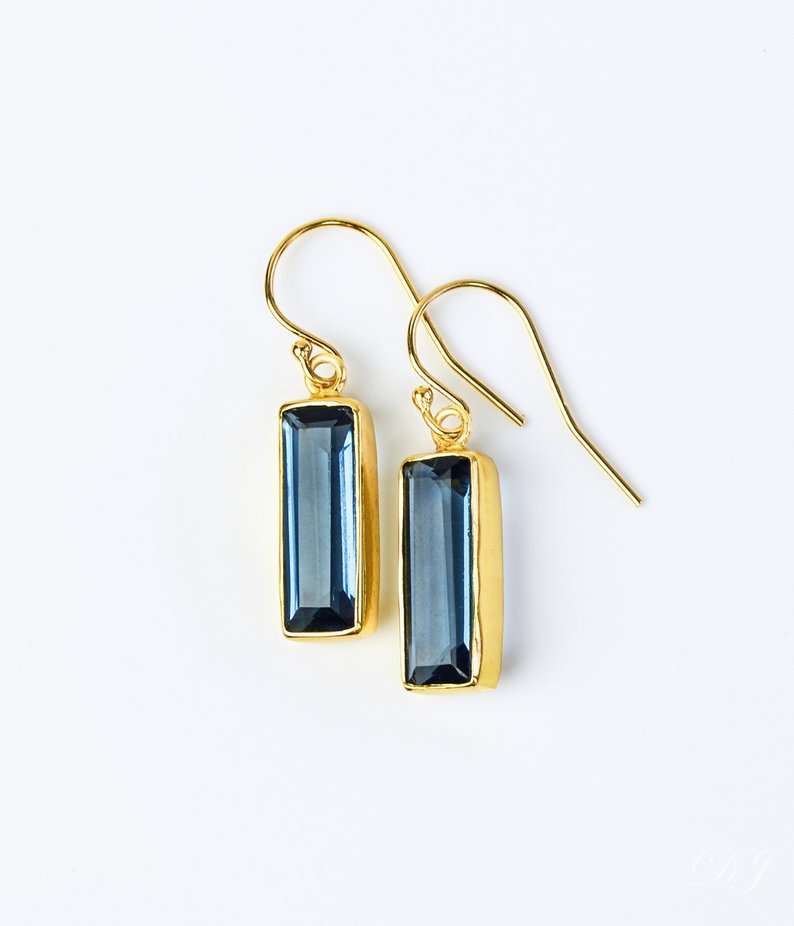 Blue kyanite gemstone earrings in yellow gold