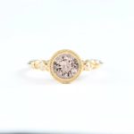 Morganite-diamond three-stone engagement ring