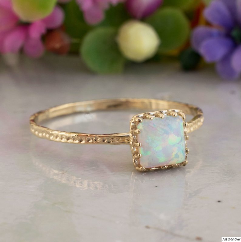 Opal ring in gold setting
