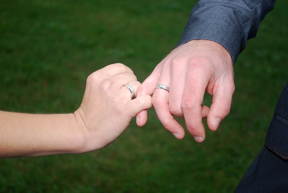 Couple wearing palladium rings