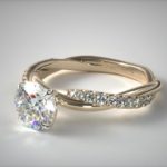 Pave engagement ring in yellow gold