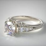 Platinum engagement ring with side stones