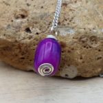 Purple sugilite pendant
