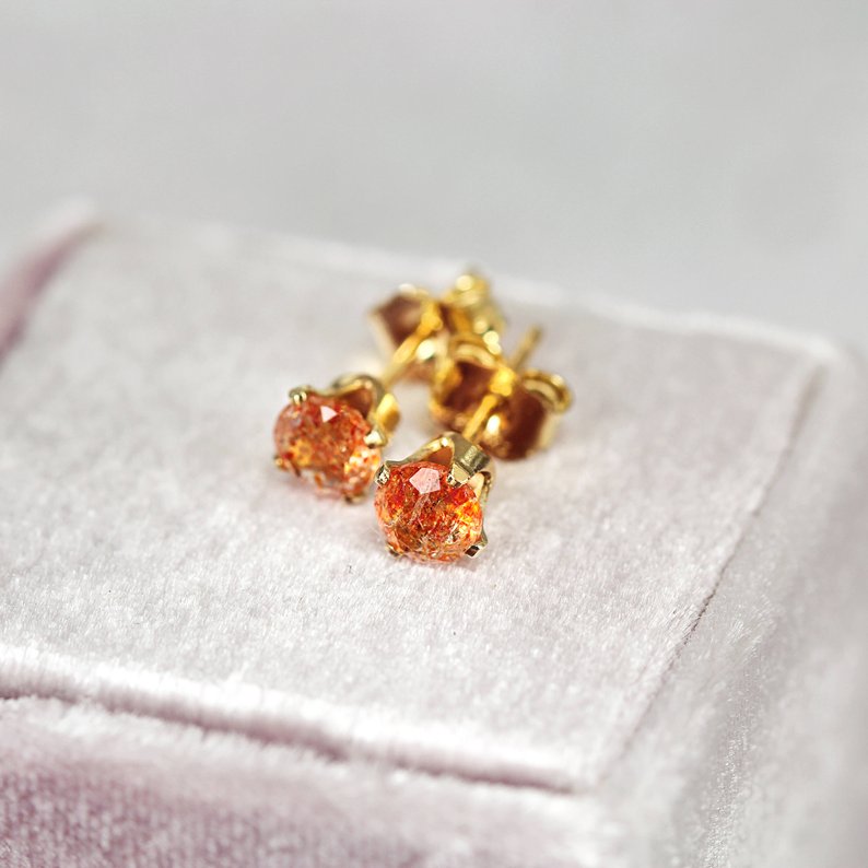 striking sunstone studs for hair let down style