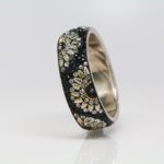 Bangle with flowers in black