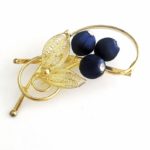 Brooch with gold tone