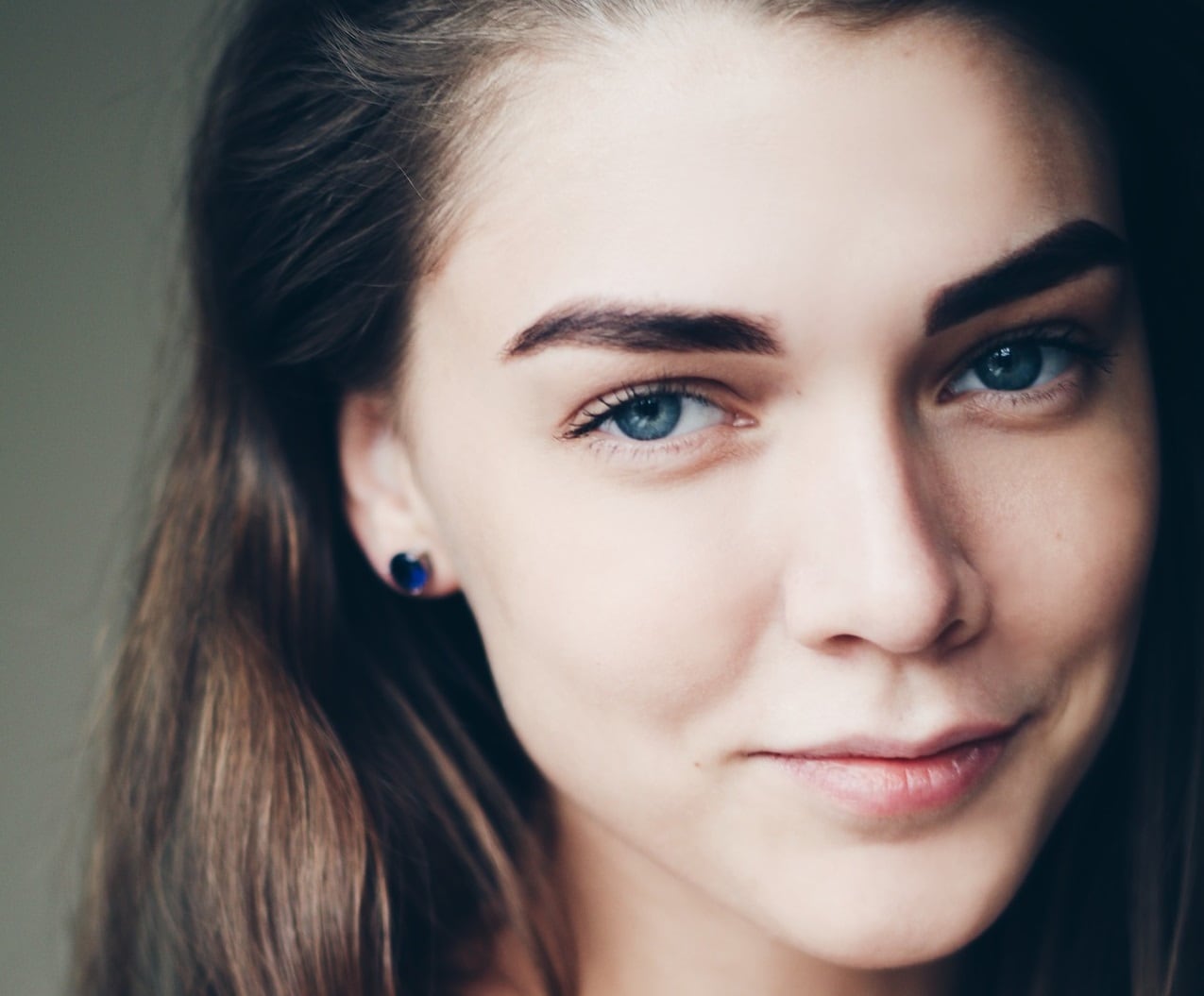 Girl wearing non pierced earrings