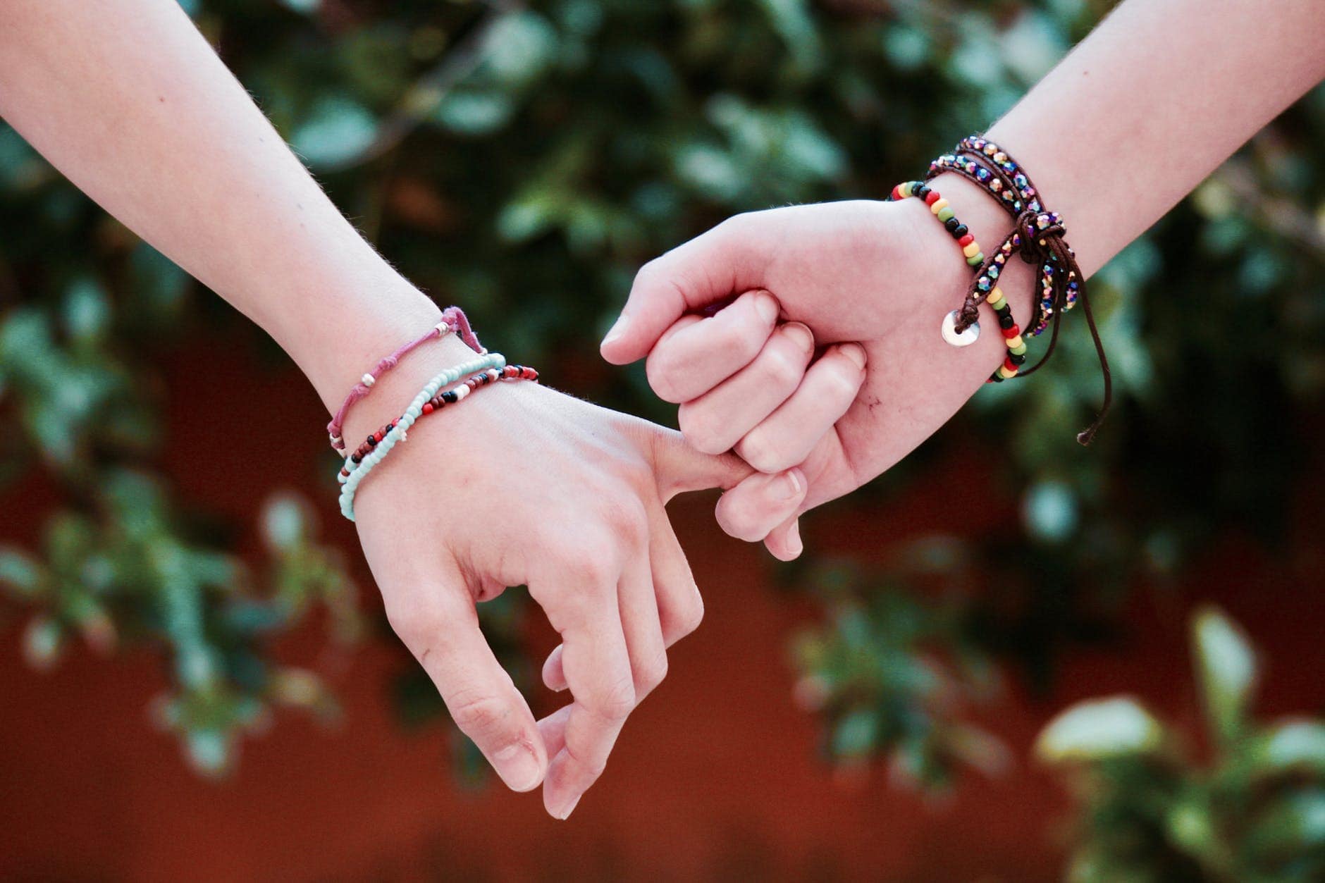 Friends wearing friendship bracelet