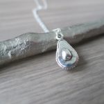 silver avocado pendant