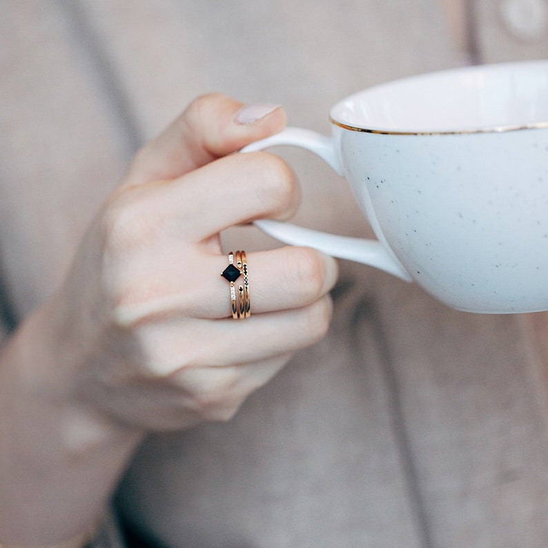 Stacking rings with black stone