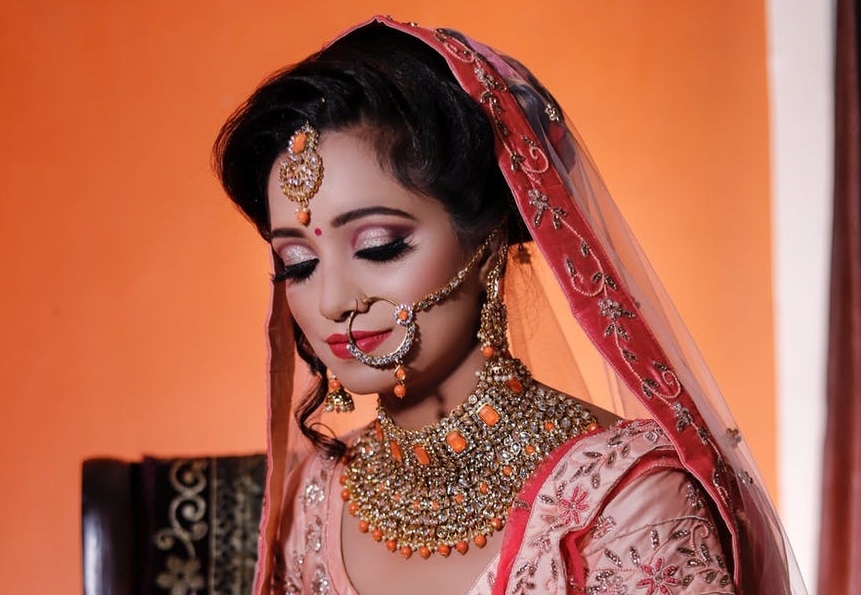 Girl wearing polki Indian jewelry