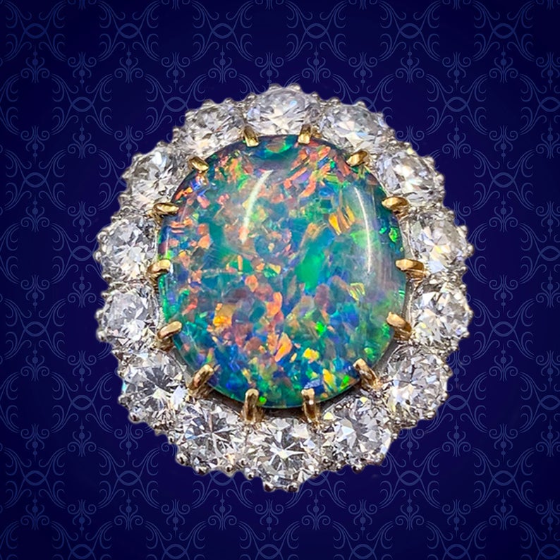black opal and diamond rings close up