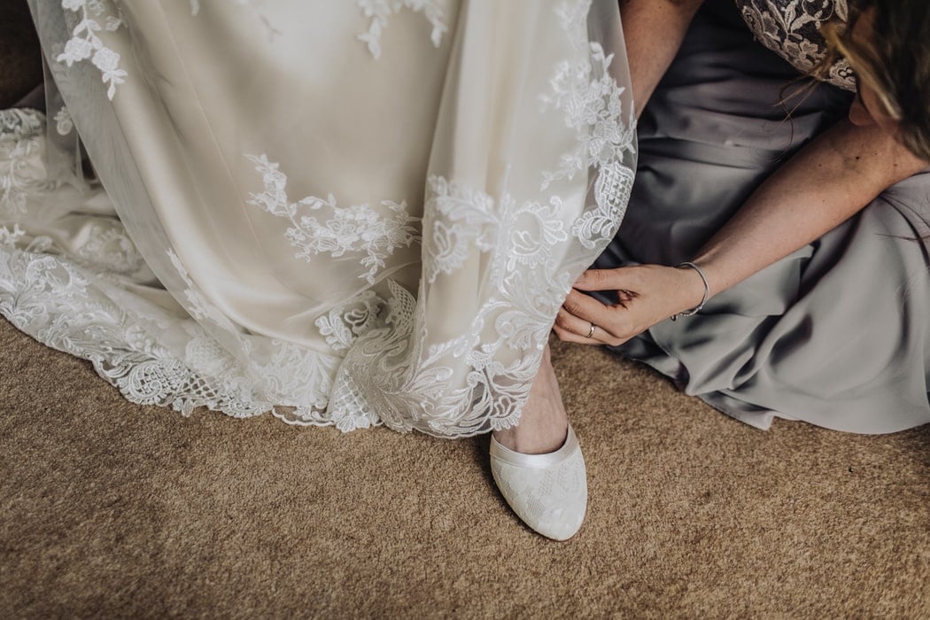 Bride trying on shoes