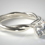 High-setting 4-prong engagement ring in white gold