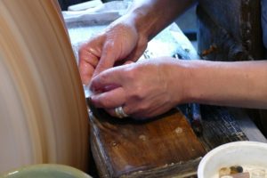 Man polishing a rough diamond