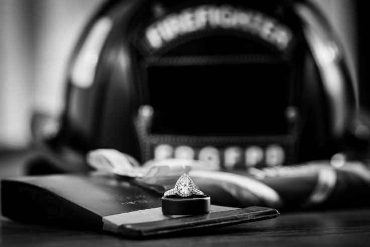 Pear shaped engagement ring in black background